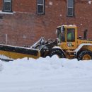 City of Tomahawk Employee Plowing Snow